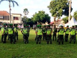 Anggota Koramil 0822/01 Bondowoso Apel Gelar Pasukan PAM Pengesahan Warga Baru PSHT di Mapolres Bondowoso